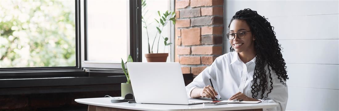 Banner image of women using a laptop